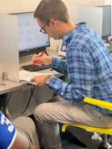 Gallagher Evelius & Jones attorney Joe Dugan prepares to help a client at an expungement clinic Bon Secours Community Resource Center in West Baltimore.